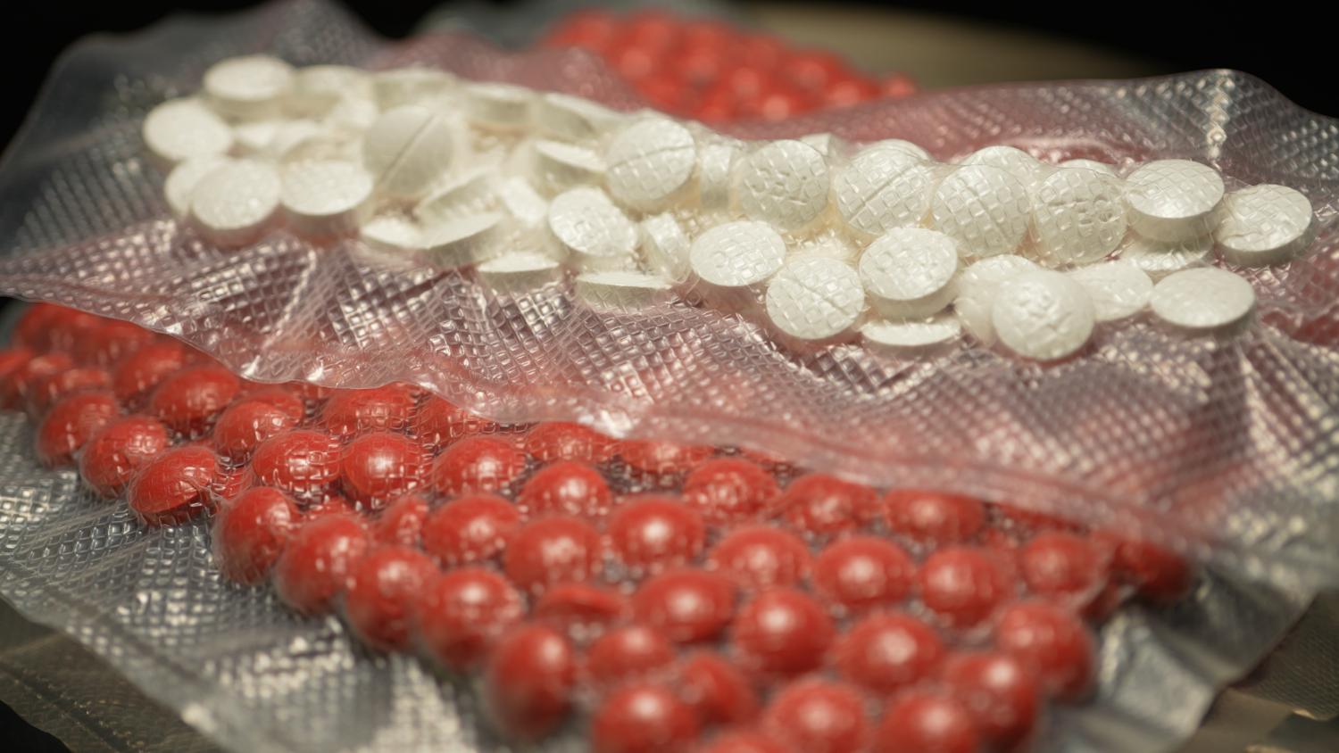 Prescription opioid packaging and medication prepared for dispensing